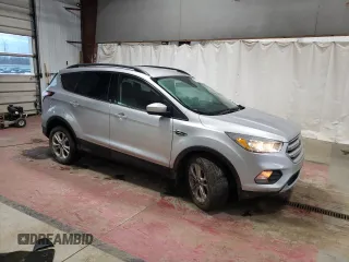2018 Ford Escape SE with VIN 1FMCU9GD7JUA25403, listed as a Copart auction lot 87158814 with 121,281 mi miles and Salvage Title. Bid and sale history available at carsss.com. Image 4.