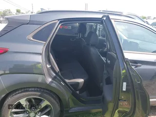 2019 Hyundai Kona Limited with VIN KM8K33A51KU384244, listed as a IAAI auction lot 42779449 with 61,195 mi miles and . Bid and sale history available at DreamBid. Image 8.