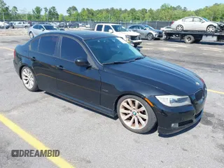 2011 BMW 3 Series 328i with VIN WBAPH7C54BE461860, listed as a IAAI auction lot 42011456 with 142,879 mi miles. Bid and sale history available at carsss.com. Image 1.