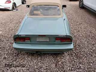1986 Alfa Romeo Spider Veloce z VIN ZARBA5417G1040320, wystawiony jako Copart lot #48623735 z przebiegiem 134 891 mil mil oraz Tytuł czysty. Historia ofert i sprzedaży dostępna na DreamBid. Obrazek 10.