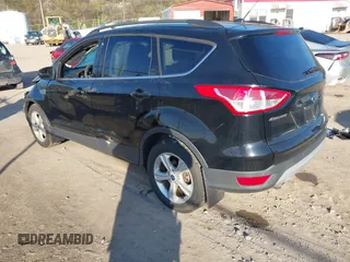 2016 Ford Escape SE with VIN 1FMCU9GX6GUB13846, listed as a IAAI auction lot 42051393 with 108,681 mi miles and . Bid and sale history available at DreamBid. Image 3.