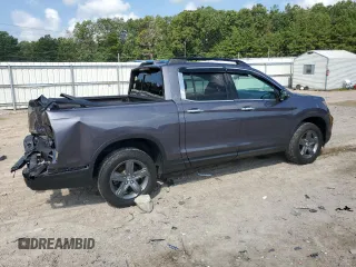 2022 Honda Ridgeline RTL-E with VIN 5FPYK3F72NB000908, listed as a Copart auction lot 65631535 with 35,796 mi miles and Salvage title. Bid and sale history available at DreamBid. Image 3.