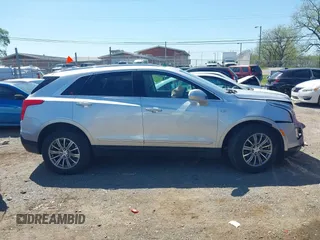 2017 Cadillac XT5 Luxury FWD z VIN 1GYKNBRS6HZ231609, wystawiony jako IAAI lot #42043791 z przebiegiem 106 594 mil mil oraz . Historia ofert i sprzedaży dostępna na DreamBid. Obrazek 13.