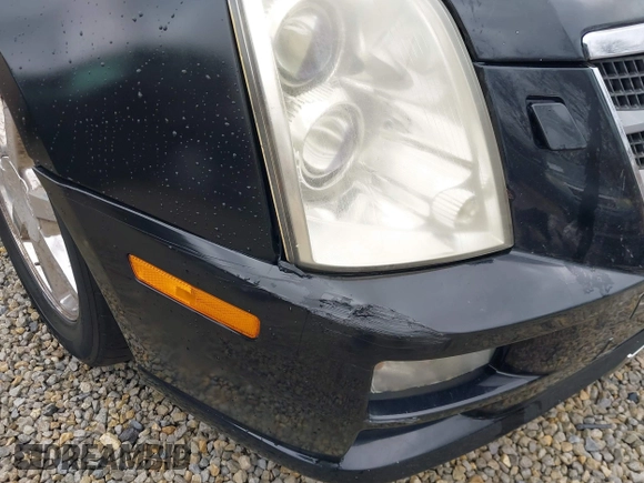 2011 Cadillac STS RWD z VIN 1G6DW6ED8B0159384, wystawiony jako IAAI lot #41840796 z przebiegiem 209 953 mil mil oraz . Historia ofert i sprzedaży dostępna na DreamBid. Obrazek 22.