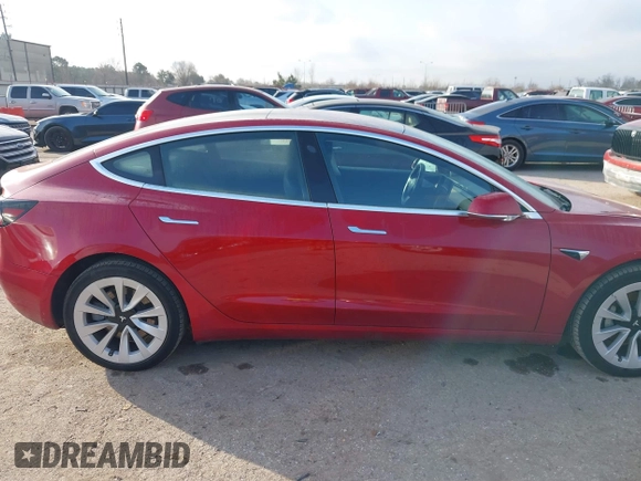 2018 Tesla Model 3 Long Range Battery with VIN 5YJ3E1EA8JF047298, listed as a IAAI auction lot 41403507 with 172,142 mi miles and . Bid and sale history available at DreamBid. Image 13.