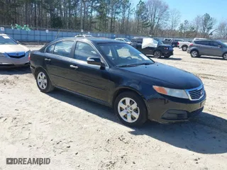 2009 Kia Optima LX with VIN KNAGE228895356661, listed as a IAAI auction lot 41821857 with 124,692 mi miles. Bid and sale history available at carsss.com. Image 1.