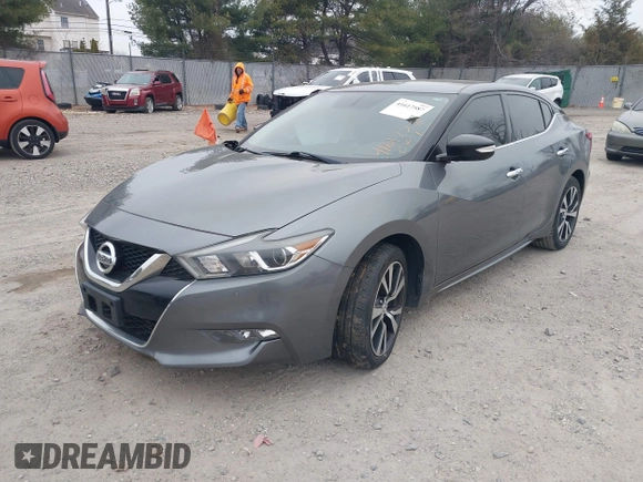 2018 Nissan Maxima S with VIN 1N4AA6AP0JC384660, listed as a IAAI auction lot 41617587 with 121,463 mi miles and . Bid and sale history available at DreamBid. Image 19.