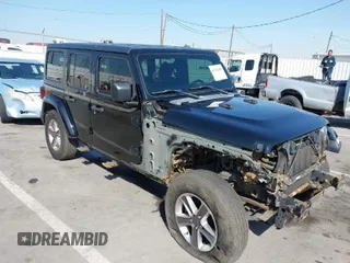 2020 Jeep Wrangler Unlimited Sahara with VIN 1C4HJXEN7LW230214, listed as a IAAI auction lot 41812466 with 59,004 mi miles. Bid and sale history available at carsss.com. Image 1.