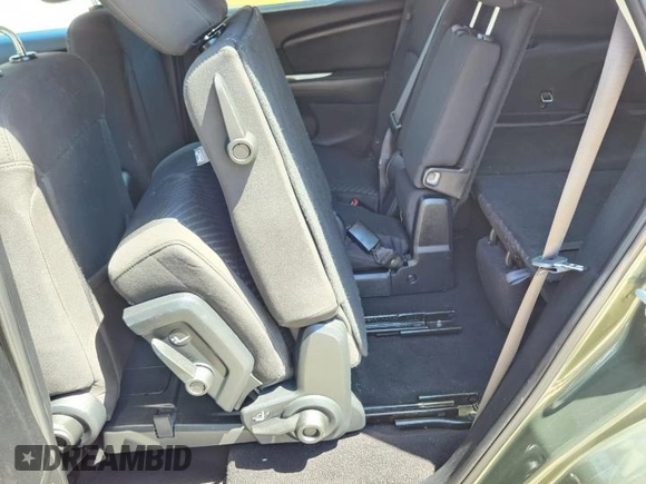 2017 Dodge Journey SXT with VIN 3C4PDCBG4HT598882, listed as a Copart auction lot 56783495 with 89,771 mi miles and Salvage Title. Bid and sale history available at DreamBid. Image 9.
