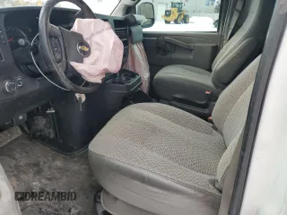 2020 Chevrolet Express Cargo Van with VIN 1GCWGAFG7L1125771, listed as a Copart auction lot 87446074 with 379,603 mi miles and Salvage Title. Bid and sale history available at carsss.com. Image 7.