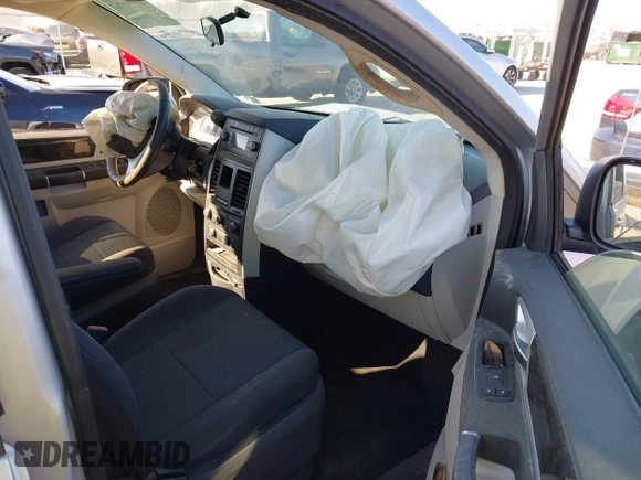 2010 Dodge Grand Caravan SXT with VIN 2D4RN5D17AR154594, listed as a IAAI auction lot 41751767 with Not Provided miles and . Bid and sale history available at DreamBid. Image 5.