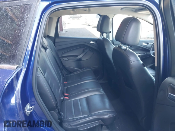 2016 Ford Escape Titanium with VIN 1FMCU9JXXGUB58961, listed as a IAAI auction lot 41772977 with 122,665 mi miles. Bid and sale history available at carsss.com. Image 8.