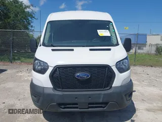 2023 Ford Transit Cargo with VIN 1FTBR2C87PKB38306, listed as a IAAI auction lot 41972454 with 51,049 mi miles and . Bid and sale history available at DreamBid. Image 12.