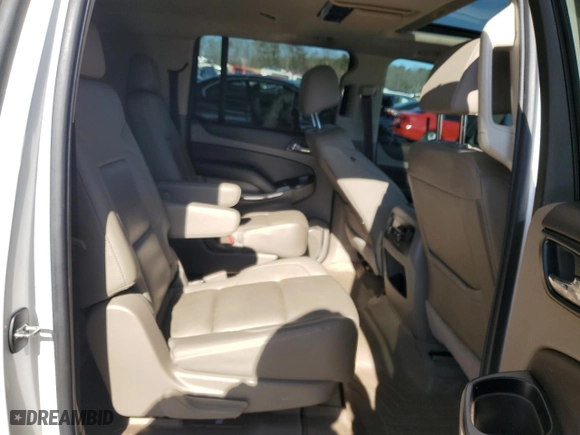 2020 Chevrolet Suburban Premier with VIN 1GNSKJKC0LR276184, listed as a Copart auction lot 88840565 with 87,563 mi miles and Salvage Title. Bid and sale history available at carsss.com. Image 10.