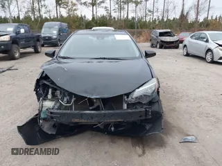2018 Toyota Corolla L z VIN 2T1BURHEXJC098608, wystawiony jako IAAI lot #41168514 z przebiegiem 134 623 mil mil oraz . Historia ofert i sprzedaży dostępna na DreamBid. Obrazek 12.