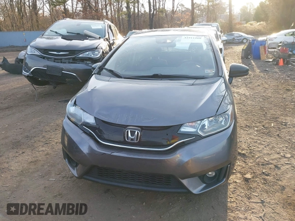 2017 Honda Fit EX with VIN 3HGGK5G71HM700340, listed as a IAAI auction lot 41911268 with 82,973 mi miles and . Bid and sale history available at DreamBid. Image 12.