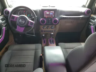 2012 Jeep Wrangler Unlimited Sahara with VIN 1C4BJWEG4CL120370, listed as a Copart auction lot 58744135 with 166,455 mi miles and Clean title. Bid and sale history available at DreamBid. Image 8.
