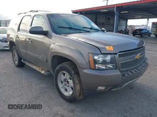 2012 Chevrolet Tahoe LT with VIN 1GNSCBE03CR261019, listed as a IAAI auction lot 42212500 with 214,713 mi miles and . Bid and sale history available at DreamBid. Image 1.