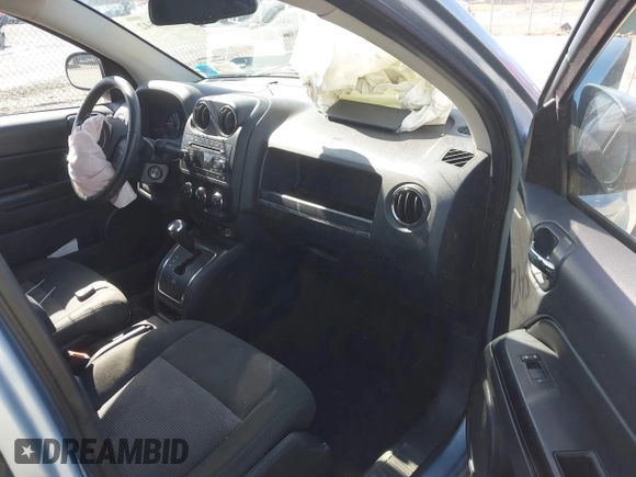 2013 Jeep Compass Latitude with VIN 1C4NJDEB2DD263920, listed as a IAAI auction lot 41832542 with 128,018 mi miles. Bid and sale history available at carsss.com. Image 5.