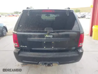 2005 Jeep Grand Cherokee Laredo with VIN 1J4HR48N75C647740, listed as a IAAI auction lot 41803160 with 145,147 mi miles. Bid and sale history available at carsss.com. Image 16.