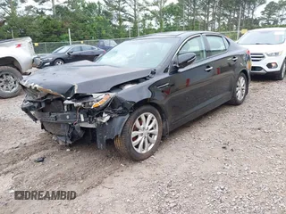 2014 Kia Optima EX z VIN 5XXGN4A77EG330968, wystawiony jako IAAI lot #42209541 z przebiegiem 106 888 mil mil oraz . Historia ofert i sprzedaży dostępna na DreamBid. Obrazek 2.