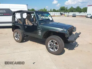 2002 Jeep Wrangler Sport with VIN 1J4FA49S52P760173, listed as a IAAI auction lot 42468550 with 201,682 mi miles and . Bid and sale history available at DreamBid. Image 1.