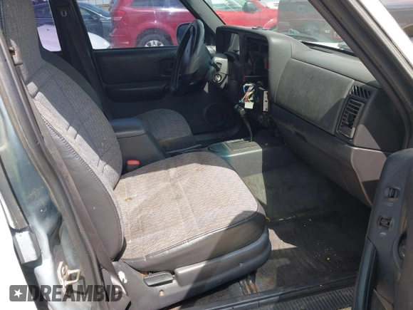 2001 Jeep Cherokee Sport with VIN 1J4FT48S71L503551, listed as a IAAI auction lot 42660835 with Not provided miles and . Bid and sale history available at DreamBid. Image 5.