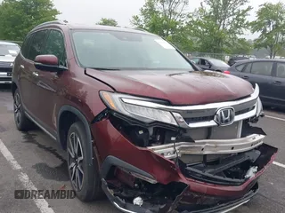 2021 Honda Pilot Touring 8-Passenger with VIN 5FNYF6H92MB002640, listed as a IAAI auction lot 42433382 with 47,428 mi miles and . Bid and sale history available at DreamBid. Image 1.