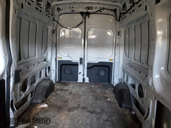 2022 Ford Transit Cargo z VIN 1FTBR2X82NKA72092, wystawiony jako Copart lot #50320405 z przebiegiem 48 664 mil mil oraz Szkody całkowita. Historia ofert i sprzedaży dostępna na DreamBid. Obrazek 10.