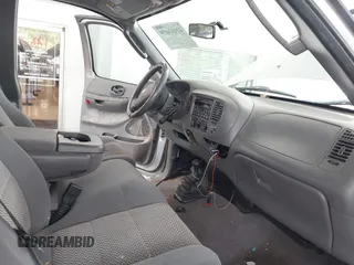 2003 Ford F-150 XL с VIN 2FTRX18W03CA23003, выставлен на аукционе IAAI как лот 42403479 с пробегом 316 789 миль миль и . История ставок и продаж доступна на DreamBid. Изображение 5.