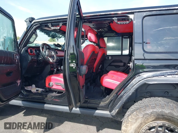 2022 Jeep Wrangler Unlimited Rubicon with VIN 1C4HJXFN0NW242903, listed as a IAAI auction lot 41448636 with 28,007 mi miles and . Bid and sale history available at DreamBid. Image 8.