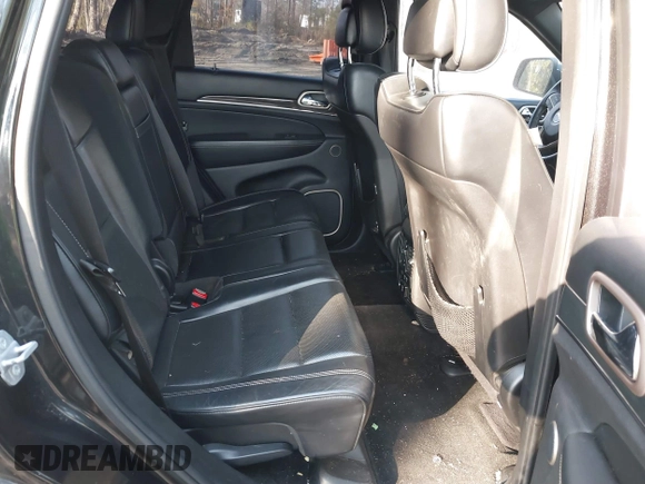 2015 Jeep Grand Cherokee Overland with VIN 1C4RJECGXFC957530, listed as a IAAI auction lot 41633522 with 168,258 mi miles and . Bid and sale history available at DreamBid. Image 8.