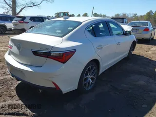 2020 Acura ILX w/Premium Pkg with VIN 19UDE2F74LA005883, listed as a IAAI auction lot 41727158 with 103,698 mi miles. Bid and sale history available at carsss.com. Image 4.