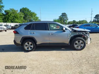 2019 Toyota RAV4 XLE with VIN JTMW1RFV7KD041106, listed as a IAAI auction lot 41759077 with 187,723 mi miles and . Bid and sale history available at DreamBid. Image 14.