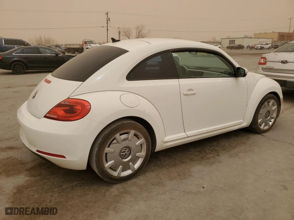 2012 Volkswagen Beetle 2.5L w/Sound/Nav PZEV with VIN 3VWJP7AT2CM642252, listed as a Copart auction lot 48182585 with 141,778 mi miles and Salvage Title. Bid and sale history available at carsss.com. Image 3.