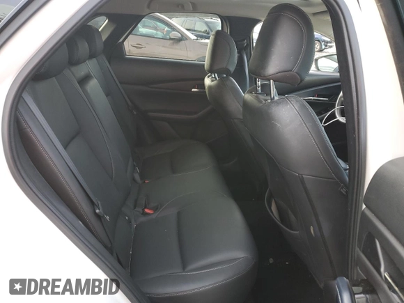 2021 Mazda CX-30 Preferred z VIN 3MVDMBCLXMM222277, wystawiony jako Copart lot #82465924 z przebiegiem 90 863 mil mil oraz Szkoda całkowita • Salvage title. Historia ofert i sprzedaży dostępna na DreamBid. Obrazek 11.