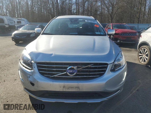 2015 Volvo XC60 z VIN YV4940RA8F2609421, wystawiony jako Copart lot #86134784 z przebiegiem 20 214 mil mil oraz Szkoda całkowita • Salvage title. Historia ofert i sprzedaży dostępna na DreamBid. Obrazek 5.