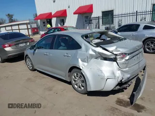 2021 Toyota Corolla LE with VIN 5YFEPMAE2MP166647, listed as a IAAI auction lot 41670097 with 143,557 mi miles. Bid and sale history available at carsss.com. Image 3.