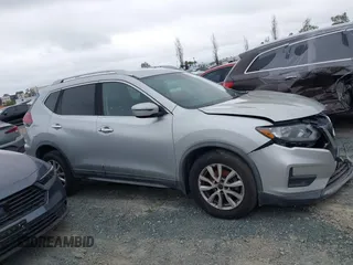 2018 Nissan Rogue S with VIN KNMAT2MT2JP554158, listed as a IAAI auction lot 41861713 with 198,865 mi miles and . Bid and sale history available at carsss.com. Image 13.