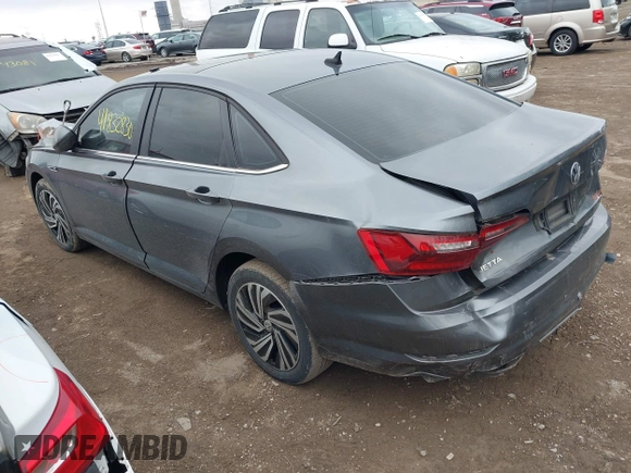 2021 Volkswagen Jetta SEL z VIN 3VWE57BU5MM086681, wystawiony jako IAAI lot #41832830 z przebiegiem 37 398 mil mil oraz . Historia ofert i sprzedaży dostępna na DreamBid. Obrazek 3.