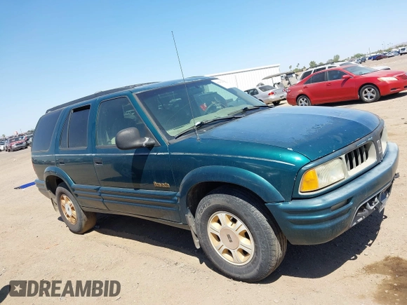 1996 Oldsmobile Bravada z VIN 1GHDT13W5T2711291, wystawiony jako IAAI lot #42502672 z przebiegiem 219 062 mil mil oraz . Historia ofert i sprzedaży dostępna na DreamBid. Obrazek 12.