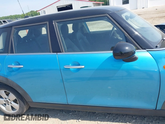 2015 MINI Hardtop 4 Door with VIN WMWXS5C56FT831505, listed as a IAAI auction lot 42155398 with 95,693 mi miles and . Bid and sale history available at DreamBid. Image 13.
