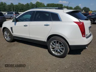2014 Cadillac SRX Performance Collection with VIN 3GYFNCE38ES629600, listed as a Copart auction lot 61622725 with 86,183 mi miles and Salvage title. Bid and sale history available at DreamBid. Image 2.