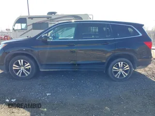 2016 Honda Pilot EX-L z VIN 5FNYF6H54GB106872, wystawiony jako IAAI lot #42099549 z przebiegiem 118 082 mil mil oraz . Historia ofert i sprzedaży dostępna na DreamBid. Obrazek 14.