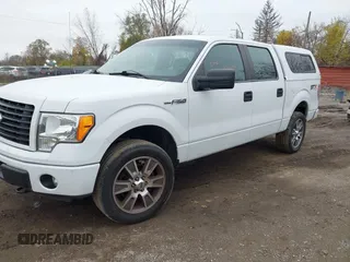 2014 Ford F-150 XL with VIN 1FTFW1EFXEFB08741, listed as a IAAI auction lot 40930645 with 138,394 mi miles and . Bid and sale history available at DreamBid. Image 2.