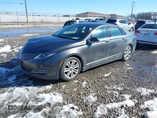 2016 Lincoln MKZ z VIN 3LN6L2JK1GR623839, wystawiony jako IAAI lot #41652096 z przebiegiem 109 931 mil mil oraz . Historia ofert i sprzedaży dostępna na DreamBid. Obrazek 17.