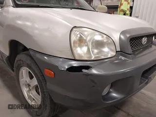 2004 Hyundai Santa Fe GLS with VIN KM8SC73D44U757341, listed as a IAAI auction lot 42254675 with 237,770 mi miles and . Bid and sale history available at DreamBid. Image 6.