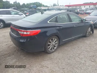 2013 Hyundai Azera with VIN KMHFH4JG5DA260461, listed as a IAAI auction lot 42603483 with 157,362 mi miles and . Bid and sale history available at DreamBid. Image 4.