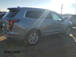 2023 Cadillac XT6 FWD Luxury z VIN 1GYKPAR48PZ115719, wystawiony jako Copart lot #87848435 z przebiegiem 17 597 mil mil oraz Szkoda całkowita • Salvage title. Historia ofert i sprzedaży dostępna na DreamBid. Obrazek 3.