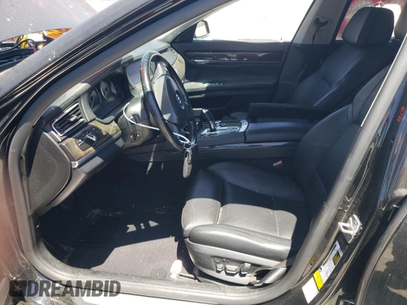 2012 BMW 7 Series 740i with VIN WBAKA4C59CDS99342, listed as a Copart auction lot 63705894 with 0 mi miles and Salvage Title. Bid and sale history available at carsss.com. Image 7.